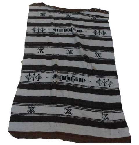 A Turkish Kilim brown and cream striped rug, decorated with alternate cream stripes with...