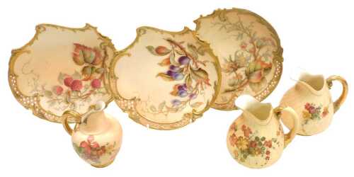 A set of three Royal Worcester blush porcelain plates, and three jugs, the plates painted with...