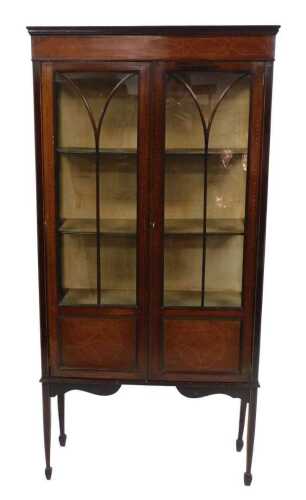 An Edwardian mahogany display cabinet, with line inlay, the pediment over a pair of astragal...