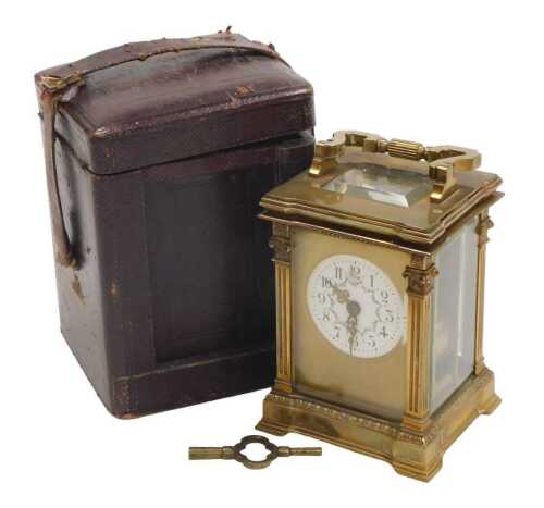 A late 19thC brass cased carriage clock, circular enamel dial painted with swags of flowers,...
