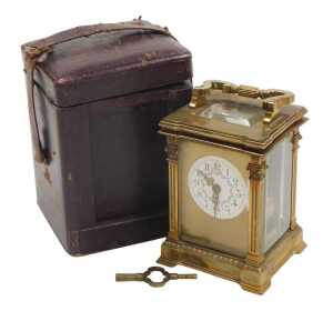 A late 19thC brass cased carriage clock, circular enamel dial painted with swags of flowers,...