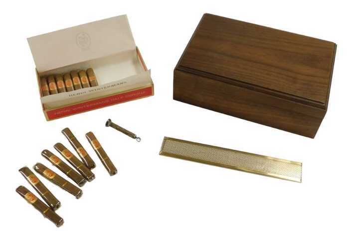 A Decatur teak cased humidor, containing a box with fourteen Henri Wintermans Half Corona cigars,...