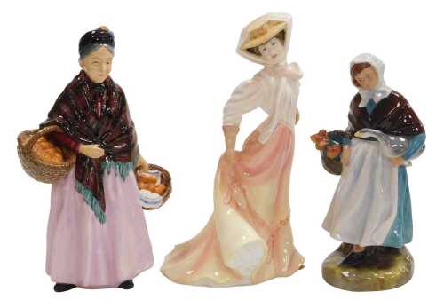 Three Royal Doulton figures, modelled as The Open Road HN1461, Country Lass HN911, and The...