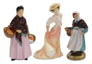 Three Royal Doulton figures, modelled as The Open Road HN1461, Country Lass HN911, and The...