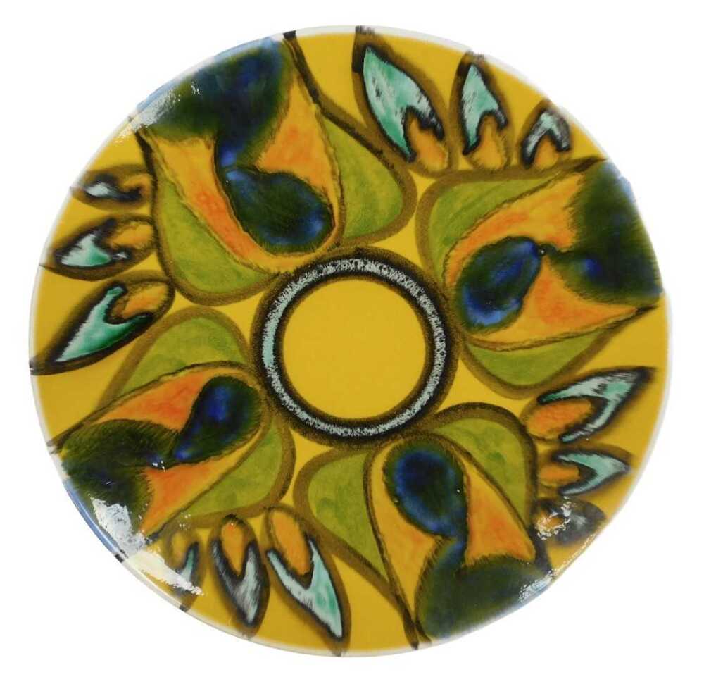 A Poole Pottery Delphis charger, yellow ground decorated with a repeat ...