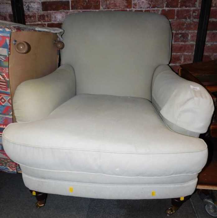 A contemporary armchair in Howard and Sons style, upholstered in duck egg blue fabric, on turned...