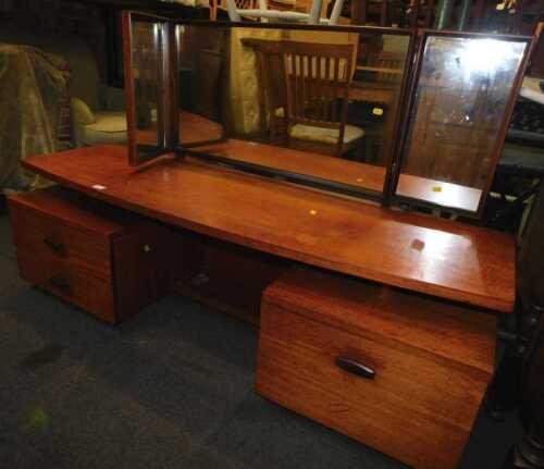A teak mirror back dressing table.