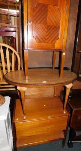 A group of furniture, comprising a walnut and inlaid occasional table, a mahogany pot cupboard,...