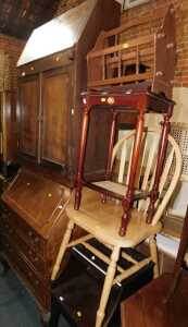 A group of furniture, to include a walnut bureau, an oak bureau, magazine rack, occasional table,...