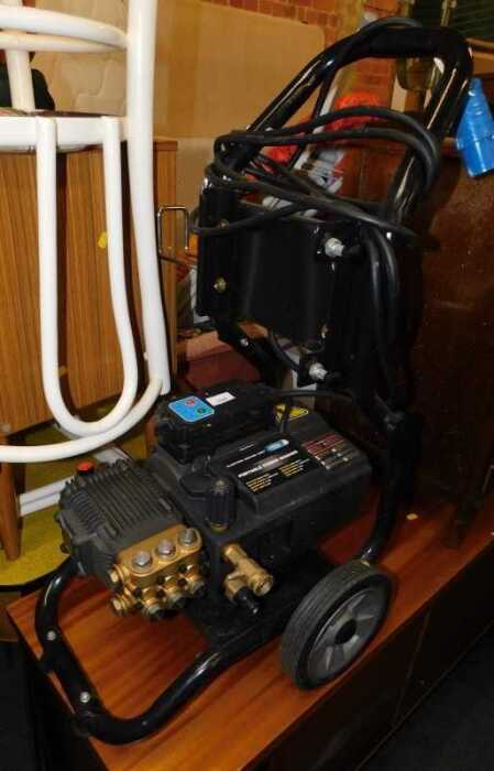 An electric motor unit portable power washer.