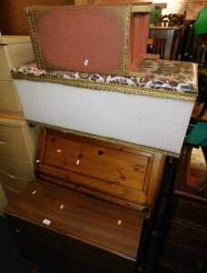 A pine bureau, 28cm high, 83cm wide, together with a Lloyd Loom style ottoman, Lloyd Loom style...