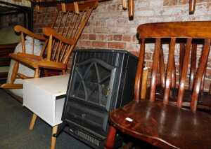 A group of furniture, to include a pair of kitchen chairs, a beech rocking chair, electric fire,...