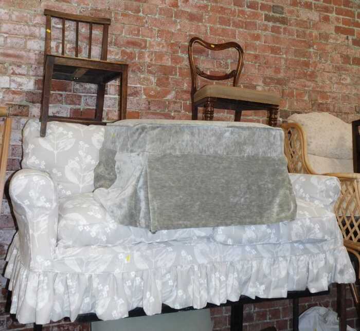 A Laura Ashley two seater sofa, together with a footstool, a Victorian rosewood dining chair,...
