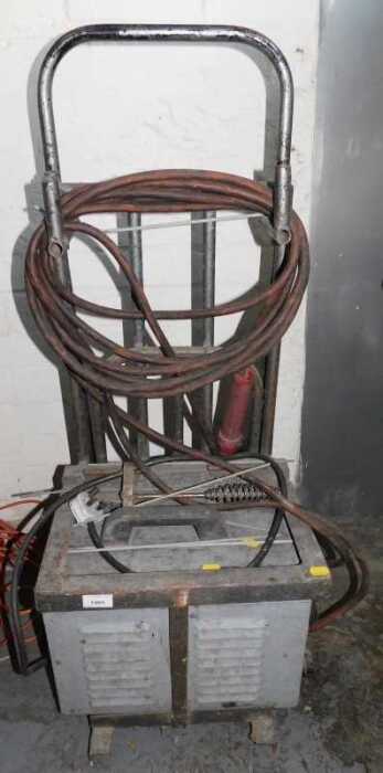 An arc welder, on a sack barrow.