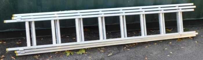 A three sectional extending ladder.