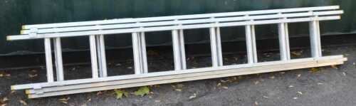 A three sectional extending ladder.