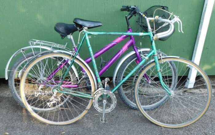 A Carlton Workshop England racing bicycle, with a metallic green frame, together with an Apollo...