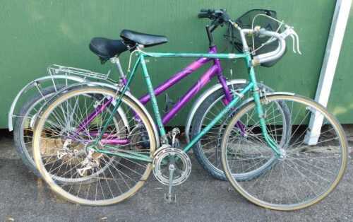 A Carlton Workshop England racing bicycle, with a metallic green frame, together with an Apollo...