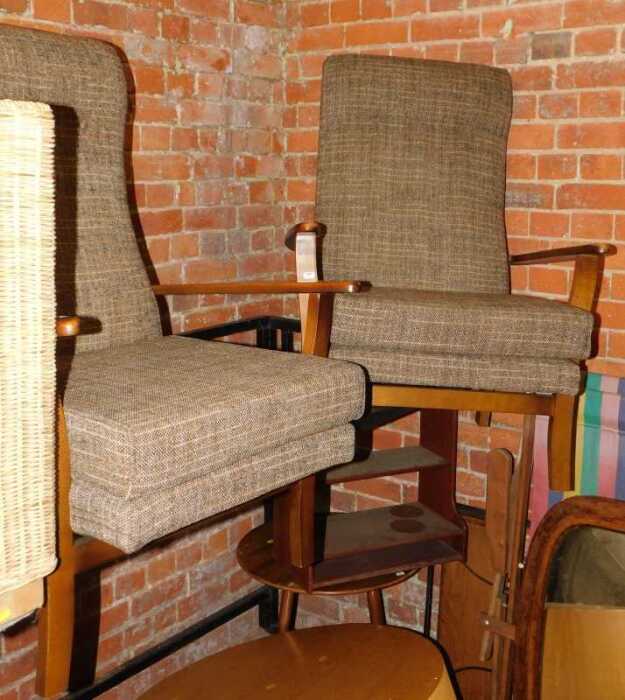 Two oak framed chairs, with tartan upholstered seats and back.