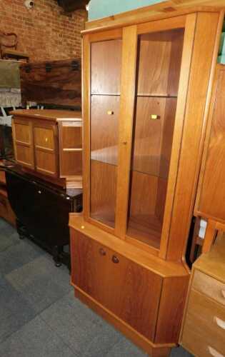 A Nathan teak television cabinet, together with a teak standing corner cabinet and an oak...