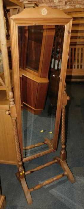 A pine cheval mirror, 152cm high.