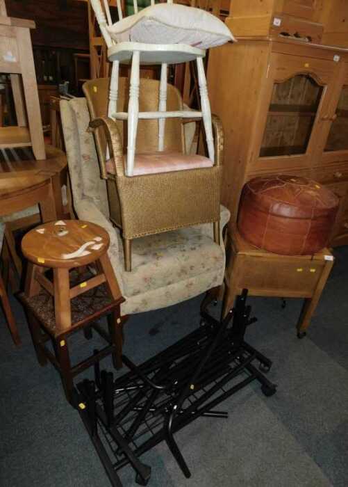 A group of furniture, to include a carved oak table, a footstool with a carved cat top, oak...