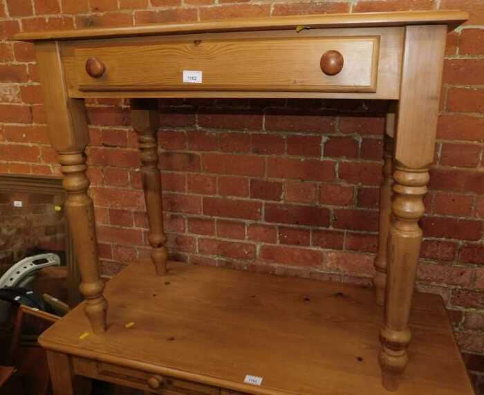 A contemporary pine side table, with single frieze drawer, raised on turned legs, 75cm high,...