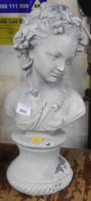 A modern composition bust of young lady, on a tapering socle, 43cm high.