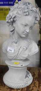 A modern composition bust of young lady, on a tapering socle, 43cm high.