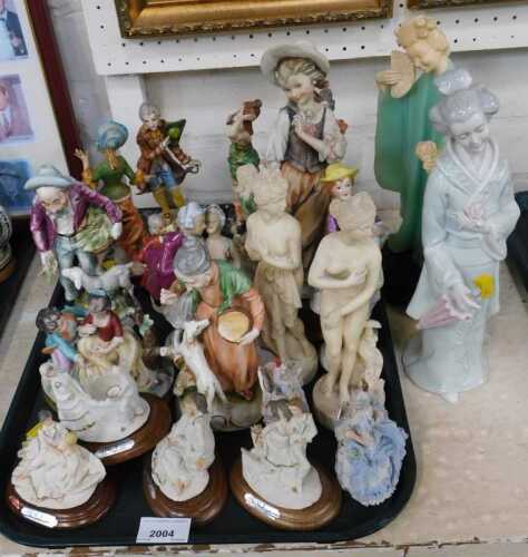 Ceramic and composition ornaments, mainly Italian or German, to include crinoline ladies. (a...