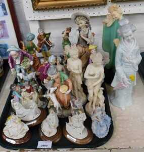 Ceramic and composition ornaments, mainly Italian or German, to include crinoline ladies. (a...
