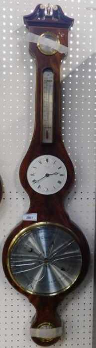 A Comitti of London mahogany and line inlaid wheel barometer, 100cm high (AF).