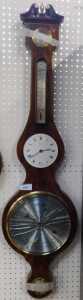 A Comitti of London mahogany and line inlaid wheel barometer, 100cm high (AF).