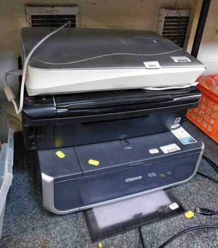 A Canon IP4300 printer, an Epson stylus SX515W printer, and a Microtek printer. (3) WARNING!...