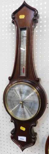 A mahogany aneroid barometer by Comitti of London, 68cm high.