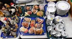 A German porcelain part coffee and dinner service, a quantity of painted plaster plaques,...