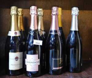 Champagne and Prosecco, to include Louis Dubrince, Chandon Rose, etc. (7)