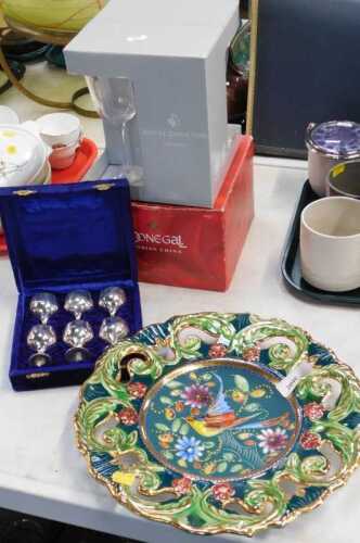 A Belgian wall plaque decorated with birds and flowers, together with a Donegal China box,...