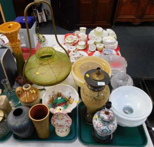 Miscellaneous ceramics, lampshades, etc., to include a brass oil lamp mount with iridescent...
