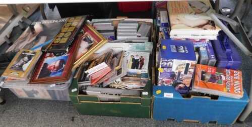 A large quantity of Elvis Presley related and other items, to include framed records, other...