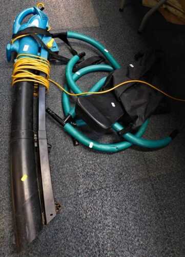 A garden blower vacuum and an exercise machine. (2)