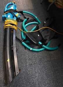 A garden blower vacuum and an exercise machine. (2)