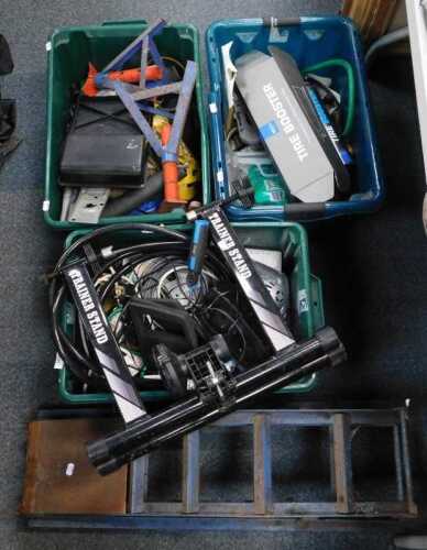 Various tools, including a hosepipe, a Piranha stapler, etc, and a bicycle trainer. (a quantity)...