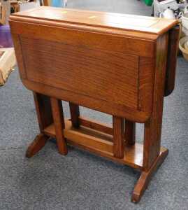 A small oak drop leaf occasional or tea table.