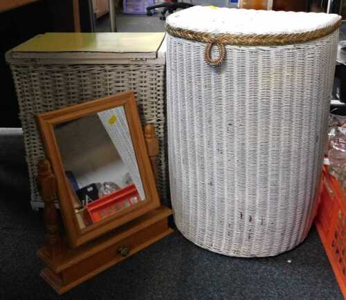 A cream painted Loom linen basket, a pine mirror, and a further linen basket.