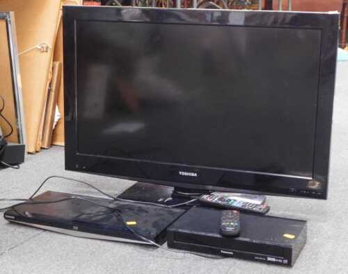 A Toshiba 32" television, together with Panasonic FreeView player, a Toshiba blu-ray DVD player,...