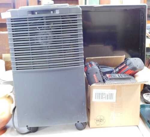 A De'Longhi dehumidifier, together with a Toshiba 32" television, and various Bosch power tool...