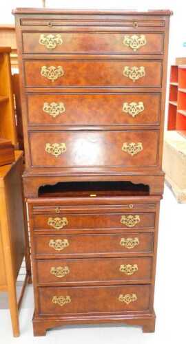A pair of 20thC walnut finish narrow chests, of four long drawers, each with a brushing slide,...