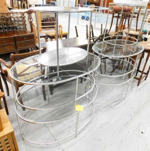Various glass stands, a pair of four tier glass stands, with silvered surrounds, and two others...