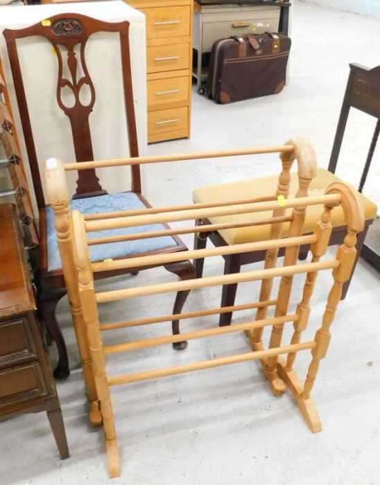 Two clothes horses, dining chair, and an overstuffed piano stool with adjusters.